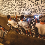 Boys at Urinal Checking Phones How to Stop Seeking Validation